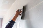 Подготовка стен из ГКЛ под покраску с помощью гипсовой шпаклевки